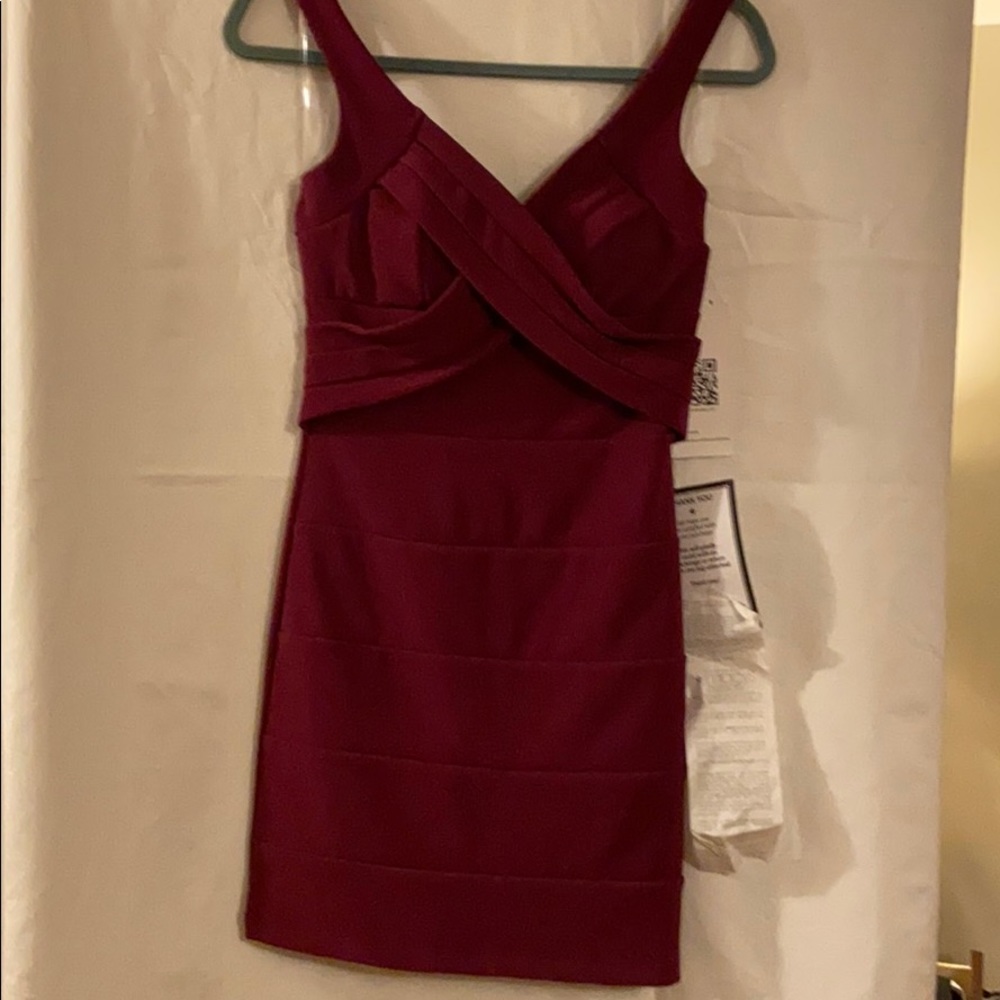 Beautiful bandage burgundy dress. NWT